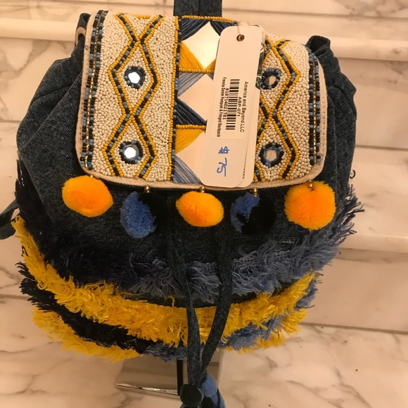 Freesia denim pompom & fringed backpack - Picture 3 of 5